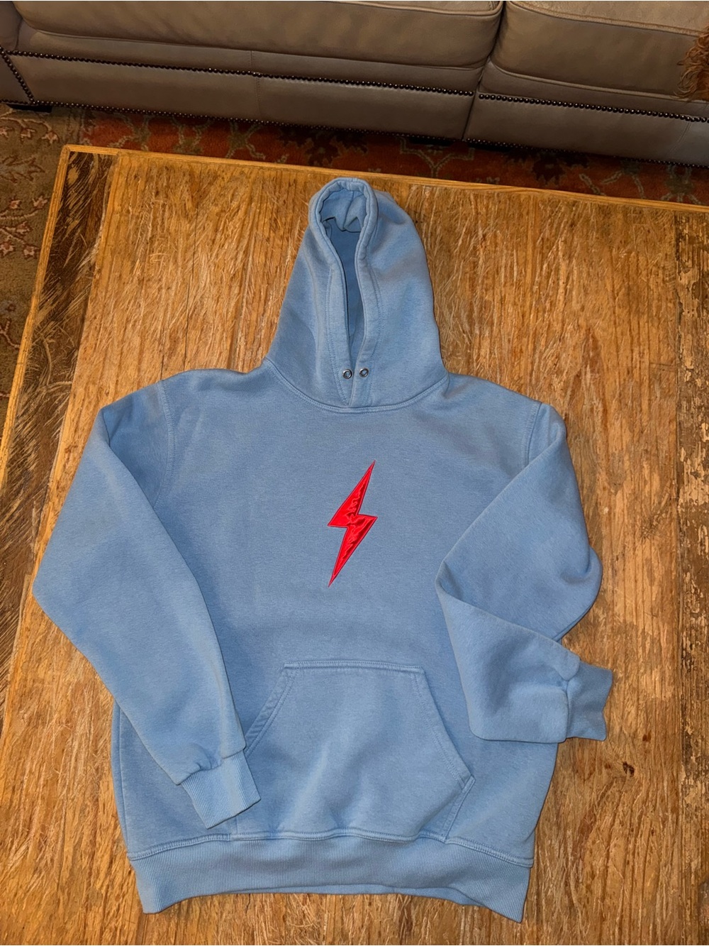 Men’s Light Blue Pullover Hoodie with Red Lightning Patch